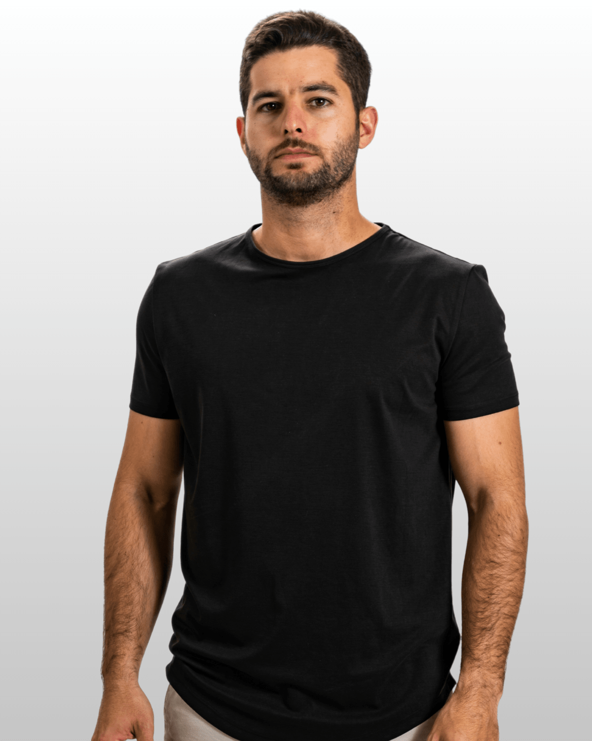 Model wearing the Neo Tokyo Tee, a black minimal t-shirt showcasing modern street style.